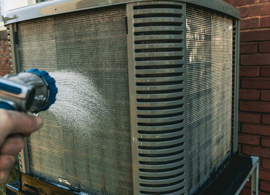 Cleaning an outdoor AC unit